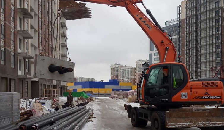 Строительство тепловой сети в новом многоэтажном жилом комплексе в г. Кудрово
